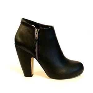 Black booties with zippered side